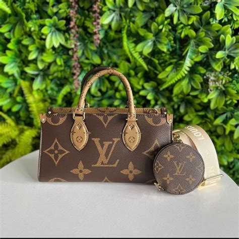 lv on the go east west bag|More.